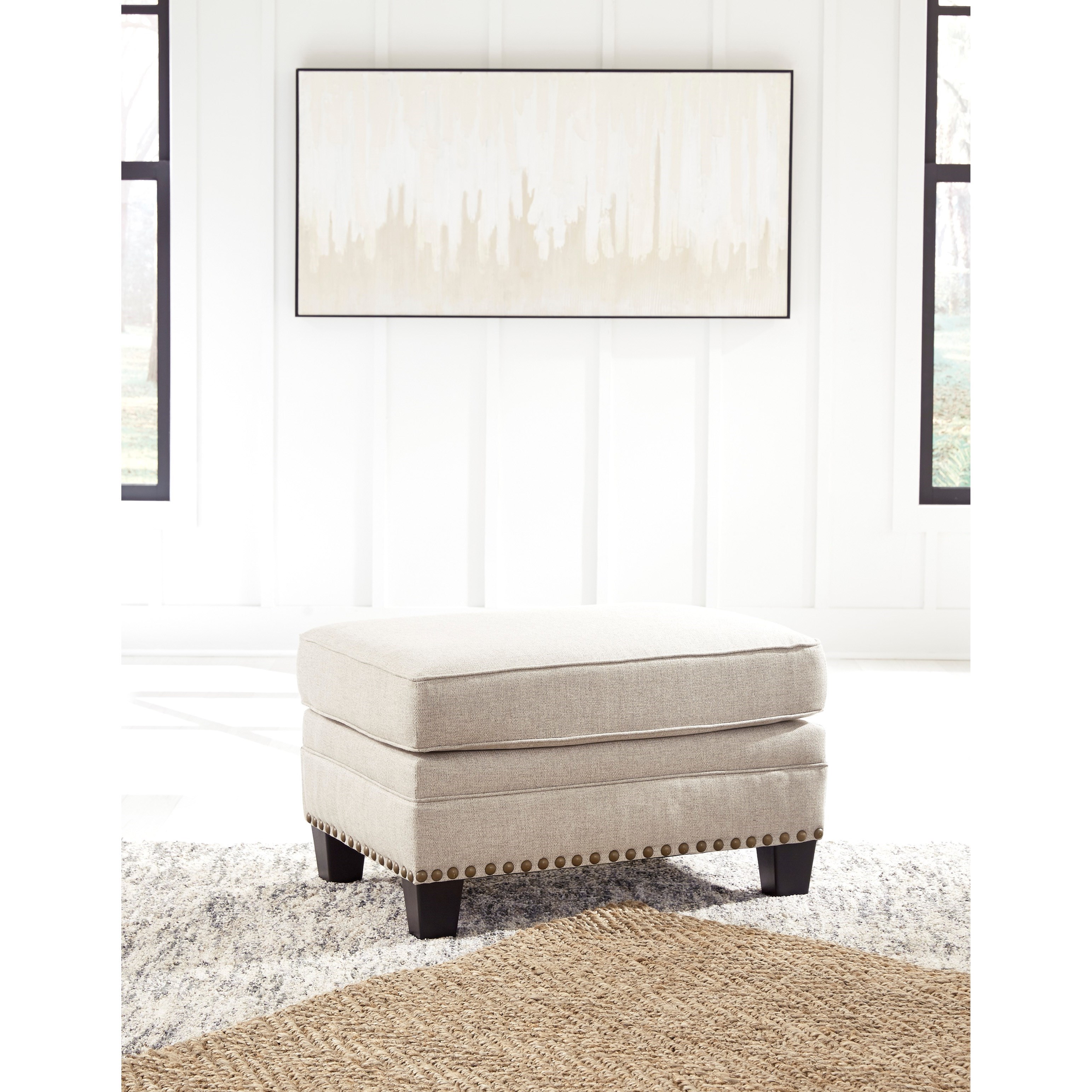 Benchcraft by Ashley Claredon Transitional Ottoman with Nailhead Trim